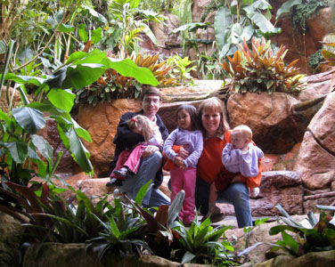 This is really in front of a decorational waterfall, but the water turned on and off at times and this was one time it had just turned off.  Baby 2 said she could not look at the camera becaus she was 'taking a nap' (yeah right)